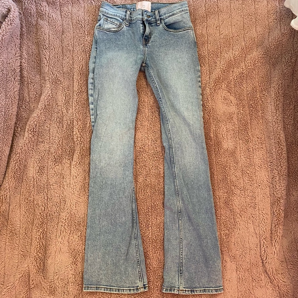 REVICE DENIM. New without tags, never worn. Revive denim’s low rise jeans.